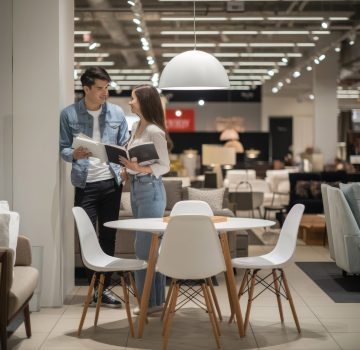 young-couple-choosing-furniture-dining-room-modern-shop-department young-couple-choosing-furniture-dining-room-modern-shop-department